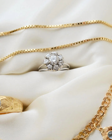 Vintage diamond cluster ring with 1 carat in 14K white gold