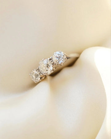 Antique threestone old cut diamond ring from England, 1910s, two carats
