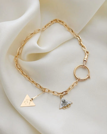 Antique enamel mourning charm from 1937 on an 18K gold watch chain