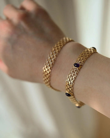 Vintage amethyst bezel set X link bracelet from 1963