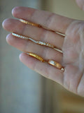 Playful Specidl Channel Set Diamond Twist Band 18K Gold