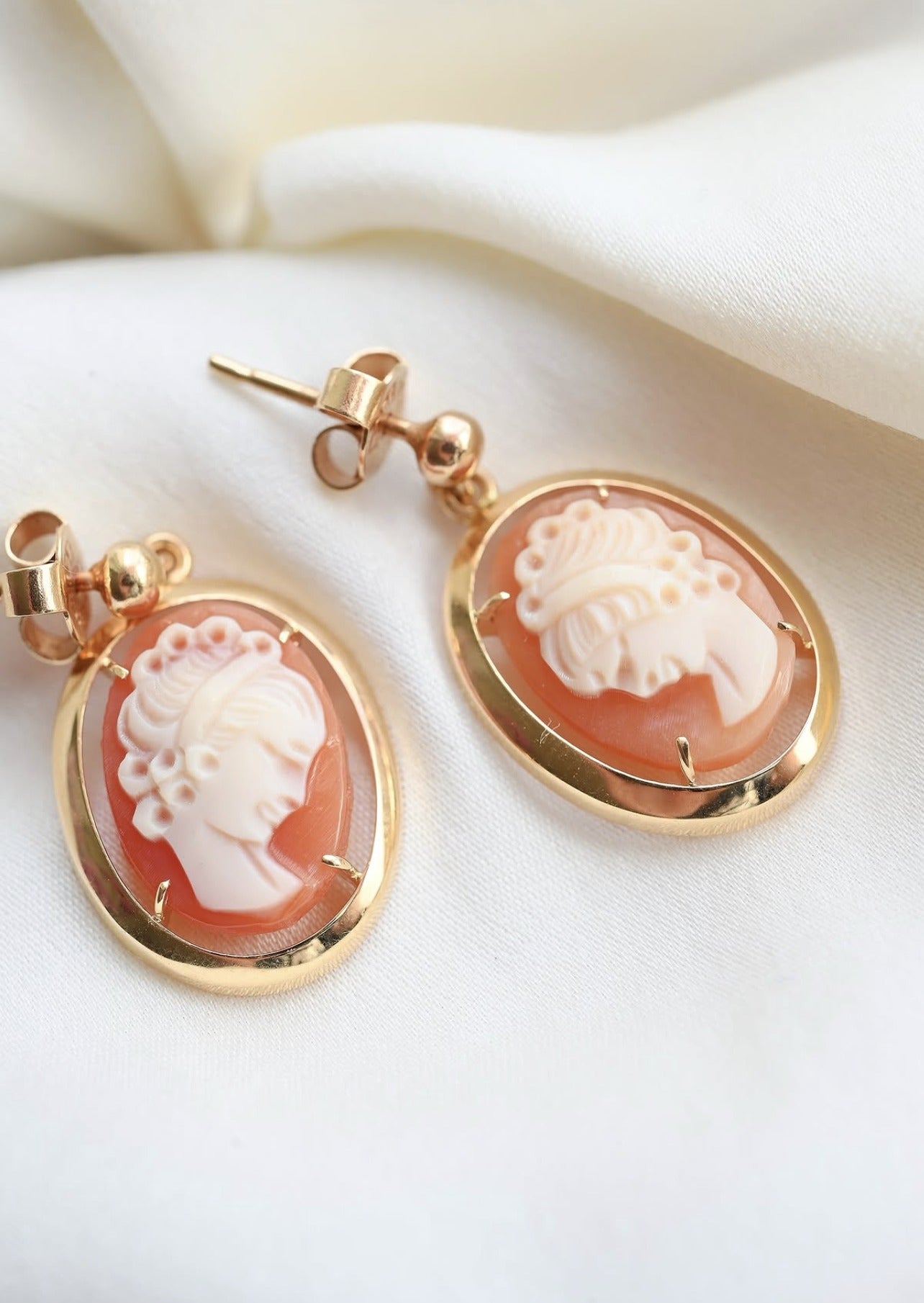 Antique 18K gold cameo drop earrings, hand carved shell cameos in open frames, on ivory silk