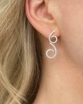 Amazing One of a Kind Diamond Earrings Swirl Dangle Design by Poul Klarlund Denmark 1990s 18K White Gold