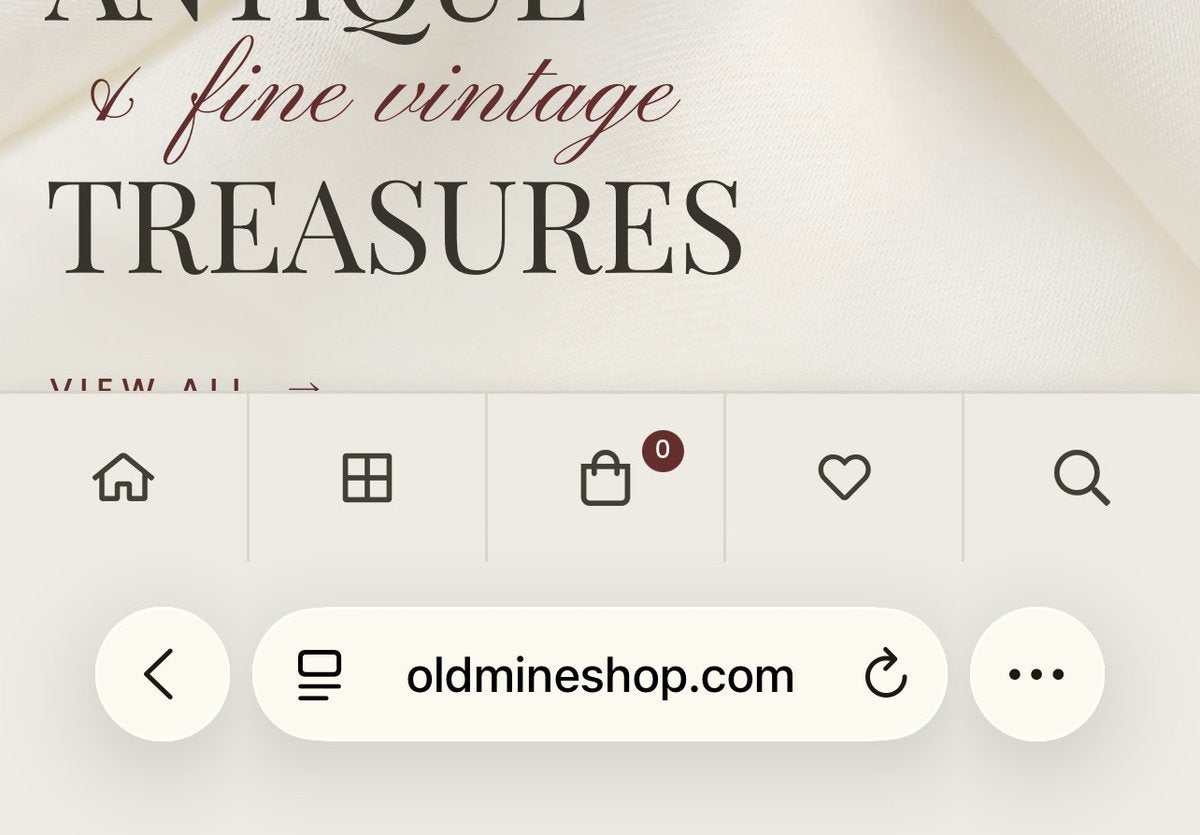 Safari on iPhone - the three dots button sits in the bottom corner